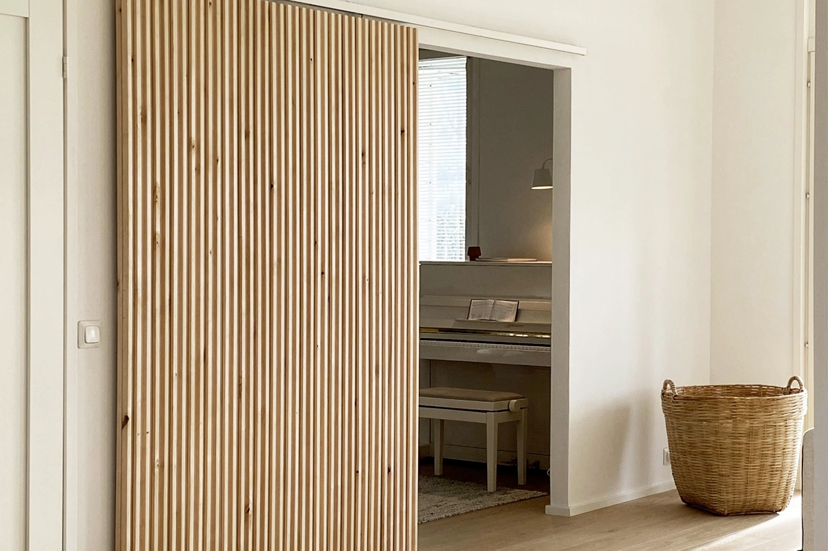 Horizontal slat door offering both ventilation and elegance.